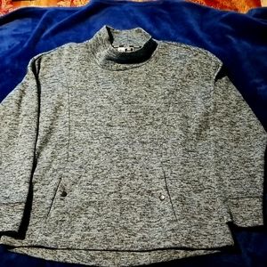 Long sleeve sweater with front pocket in excellent condition